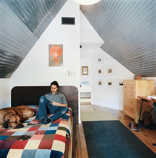 Salvage Love - Photo 4 of 10 - The bedroom takes up the small second floor of the house.