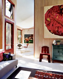 Natural light fills the home, which Watson and Tschopp decorated with a mix of modern classics, thrift-store finds, and more contemporary design pieces like the Cappellini couch.