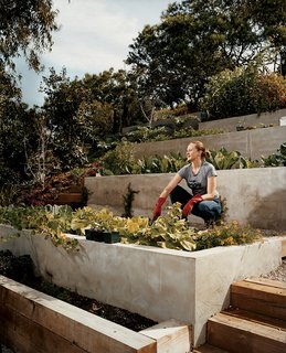 Wakeland goes to work on the garden terraces where the couple grows much of their own food.