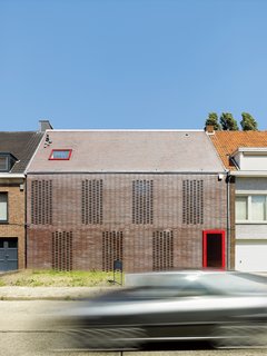 10 Homes With Distinctive Facades - Photo 7 of 10 - The facade of this house in Belgium consists of "knitted bricks" to offer maximum privacy, but also maximum light. "In this part of Belgium, 90 percent of the houses are built with brick, " says architect Tom Verschueren. "It's a classic material that we tried to use in House BVA in a totally different way."<br> <span style="color: rgb(204, 204, 204); font-size: 13px;">Photo by Frederik Vercruysse</span>