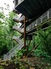 Mithun designed the tree house so that it would tread lightly on the land. The firm originally considered prefabricating the entire structure offsite but, in the research process, concluded that craning large modules into place would potentially harm the canopy. A combination of a bolted-together prefab structure and site-built wood housing yielded the least intrusive construction option.
The Summit Bechtel Reserve is located in West Virginia's coal mining country. The architects looked to the local structures—bridges, mining apparatus, and other industrial buildings—to inform the tree house's design. A 166-ton Cor-Ten steel megastructure supports the 125-foot-tall building. The use of regionally appropriate materials, like steel and black locust wood, was important to the architects. Photo 3 of Sustainability Treehouse modern home