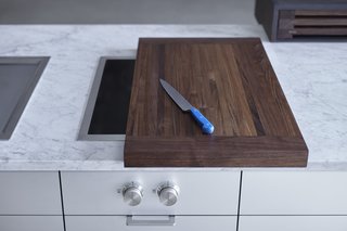 What Goes On Behind-the-Scenes at Henrybuilt’s Seattle Test Kitchen - Photo 7 of 8 - After just one day of using the kitchen, the team realized that they could design special cutting boards that slide on and off the Gaggenau modular cooking units. This way, they’d be extending the amount of usable counter space while introducing a whole new level of customization. They made it happen that same night.