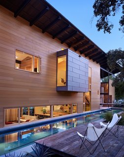 "Exposing the craft and detail of the materials was a key part of the design," Flato notes. The texture of the house, he says, can be observed in the concrete retaining wall for the lap pool.