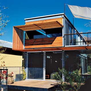 Above the front patio, the designers created a trellis of Ipe, a Brazilian hardwood. This transformed the very important function of keeping the Texas sun at bay into one of the most striking elements of the house. The sun break wraps up and then over the second story with an artist’s flair. "It does more than just shade the windows," says Bercy.