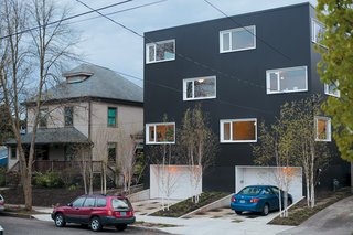 Instead of installing a typical cement slab driveway, Waechter and Crymes opted for concrete pavers mixed with patches of Corsican mint that let rainwater permeate into the ground.