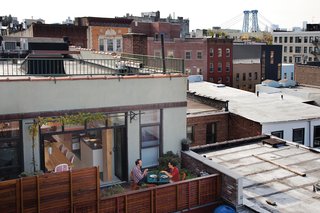 When the door to the deck is open, air flows unhindered from the kitchen to the living room. Garrick expanded the radiant heating and added a high-efficiency Fujitsu Halcyon ductless forced-air system for cooling.