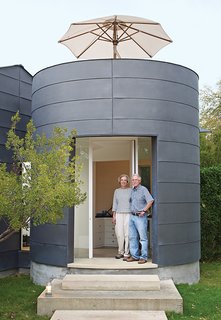 Architect Max Levy designed a home in Dallas for Deborah Orrill and Blair Sanders using small but mighty design details, like a "martini deck" tucked atop the cylindrical entry, which is clad in raw, galvanized sheet metal.