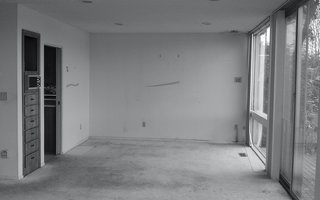 A Home's Past Mistakes Are Finally Corrected - Photo 5 of 14 - A wall used to separate the dining room from the kitchen.