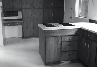 A Home's Past Mistakes Are Finally Corrected - Photo 8 of 14 - The original midcentury kitchen was dark and disconnected.