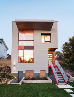 Cost-Effective Family Home in Pittsburgh - Photo 1 of 8 - By using salvaged materials—such as a steel staircase—and doing much of the work themselves, Andrew Moss and Michelle Yanefski built their house in Pittsburgh’s Lawrenceville neighborhood for $135 per square foot.