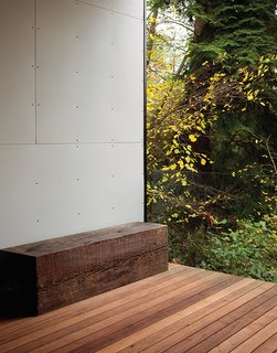 The couple's house, designed by architect L. Jane Hastings in the early 1970s, is located on a steeply sloped site that backs up to a state park.