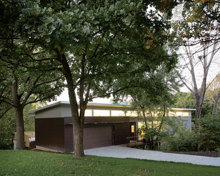 The entry bridge leading to the front door was made from timber salvaged from Christian’s parents’ farm near Kingman, Kansas.