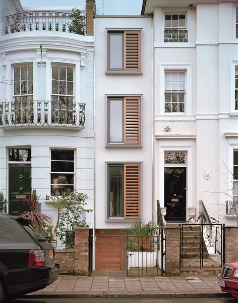 On an eight-foot-wide site in London, architect Luke Tozer cleverly squeezed in <br><br>a four-story home equipped with rain-water-harvesting and geothermal systems.