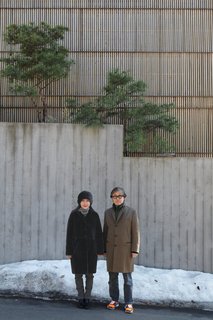 Architect Byoung-soo Cho and his wife, Eunsil Kim, value the privacy, and style, that a concrete wall and recycled Indonesian teak facade provide.
