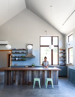 How to Design a Kitchen That’s Ideal For Entertaining—and Shop Our Picks - Photo 8 of 9 - Although it mimics the appearance of rickety mining shanties, the home is airtight. Triple-glazed windows and highly insulated walls contribute to its overall net-zero status.