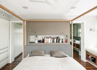 How to Take a Dwell Photo - Photo 6 of 19 - An Alcova bed from B&B Italia dominates the master bedroom. A niche behind the bed holds Berenice wall lamps by Luceplan, and the walls are painted in Cornforth White and Charleston Gray from Farrow & Ball.