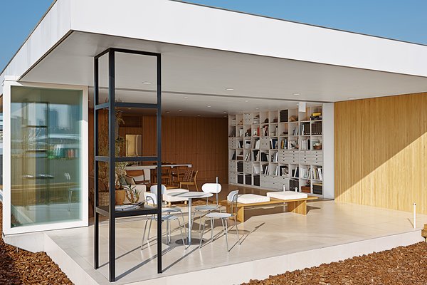 House of Furniture’s exterior, designed by Ban in collaboration with Muji, looks more like a pavilion than a box.