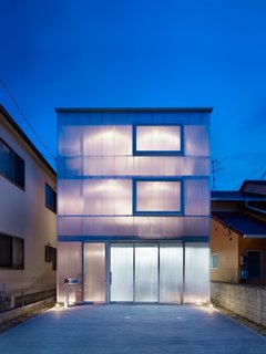 The Home That Glows in the Dark - Photo 1 of 5 - A glowing home in Japan has milky-white, one-and-a-half-inch plastic sheets wrapped around the exterior to let in light and provide insulation.