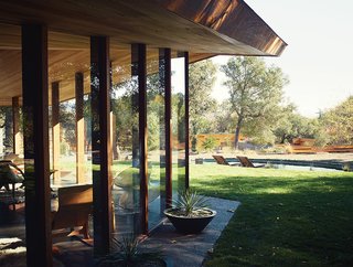 The Midcentury Home That Maintains Its Quirkiness After All These Years - Photo 1 of 9 - Katherine Lambert, a partner at Metropolitan Architectural Practice (MAP), and her business associate Christiane Robbins, painstakingly restored a 1950s redwood-and-glass house in Napa, California, originally designed by Jack Hillmer of Telesis.