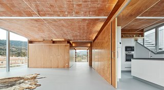 7 Historic Ceilings in Modern Homes That Have Been Beautifully Preserved - Photo 5 of 7 - In the Catalonia region of Spain, architecture firm Fake Industries Architectural Agonism in concert with Aixopluc created a house that combines industrially manufactured components with a handmade, Catalonian vaulted-brick roof.