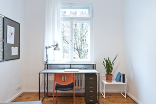 Our Dorm Definitely Did Not Look Like This - Photo 1 of 7 - Each student room has a dedicated workspace that's clean, bright, and functional. Objects and furniture had to be carefully selected or designed to make the apartment work: for instance, the steel desk was custom designed by Wierciński’s firm to double as a radiator cover.
