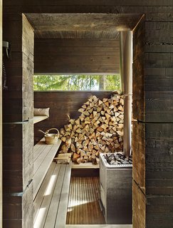 10 Sterling Saunas in Modern Homes - Photo 9 of 9 - A traditional wood-burning stove fuels the earthy sauna in this Finnish home by Bengt Mattias Carlsson.