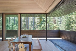 Here's What Norse Mythology and Modern Architecture Have in Common - Photo 6 of 7 - Imported Tyrolean dining chairs and a custom bench designed by Lexie pair well with the family’s antique leaf table under the Douglas Fir ceiling.