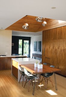 You Won't Be Calling This House a "Man Cave" - Photo 1 of 9 - Bill Thompson’s Hollywood home exudes modern cool with a custom walnut dining table and chairs from Modernica.