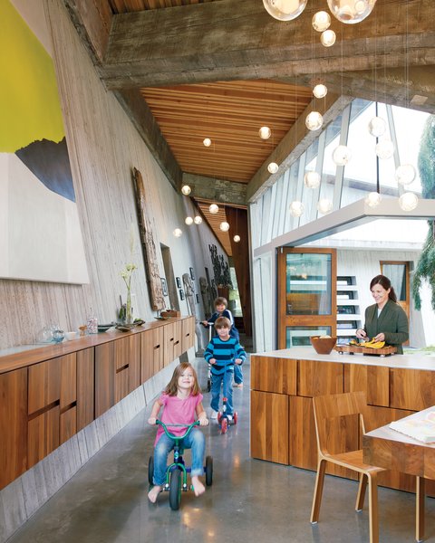 Omer Arbel, the creative director at industrial design firm Bocci, was given three parameters when he began designing a home for his colleague Randy Bishop: Create a “profound” connection between the internal and external spaces; build only one level; and, most crucially, utilize a wealth of 100-year-old beams salvaged from a series of warehouses owned by Bishop’s ancestors. Photo 2 of 23.2 House modern home