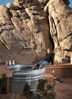 Nighttime hikes often end at the the "cowboy" hot tub where Smith soaks his feet: two nested Hastings galvanized livestock feeders. The tub is surrounded by a Veranda faux-wood deck and fed with hot water from the house’s solar hot-water system.