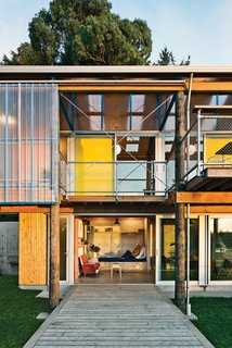 The second-story viewing platform was born from an onsite discovery. After framing the first level, Patch Work Architecture noticed a vista to the west and decided to add a window. Photo by: Paul McCredie