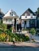 Modern home with Exterior and House. In Vancouver’s Strathcona district, two side-by-side lots now hold seven residences—thanks to a thoughtful renovation of a pair Edwardian houses and the addition of a laneway, or alley, building by Shape Architecture. The team salvaged as much 120-year-old siding as they could for use on the street-facing facades. Photo of Modern Spaces in the Pacific Northwest