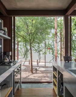 The Lowreys works with architect Luis Sanchez and a team of local craftsmen to complete the build. The custom counters in the kitchen are terrazzo and granite; the oven and cooktop are from Teka.
