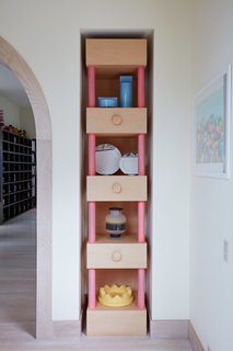 Thank Sottsass for the Most Memphis House Imaginable - Photo 5 of 14 - A tall custom niche displays various tabletop items Sottsass designed for brands Habitat, Memphis, Egizia, and Anthologie Quartett.