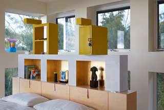 Thank Sottsass for the Most Memphis House Imaginable - Photo 8 of 14 - Renzo Brugola, a Memphis designer and cabinetmaker, built the custom bed and headboard in the master bedroom. Sottsass designed both, as well as the yellow storage units, adding a door and a lock to one of them "for the purpose of putting in our love letters," notes Adrian.