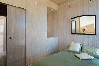 The bedroom is outfitted with only the basics.