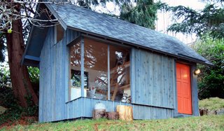 16 Inviting Countryside Cabins - Photo 13 of 16 - It doesn't get much more idyllic than this: An illustrator of children's books who lives on the Sunshine Coast of British Columbia needed a quiet workspace that was nearby, but separate from her family's bustling household. She contacted local designer, artist, and builder Riley McFerrin of Hinterland Design to replace an existing shed on her property—perched on top of a steep hill—by maintaining the old outbuilding's small footprint.