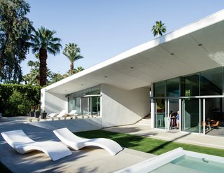 Cloe chaise longues from Myyour surround the pool.