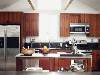 He worked with Kartheiser’s existing appliances in the kitchen, trading the old cabinetry for new teak.