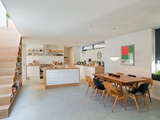 A wider look at the open-plan dining room and kitchen.