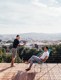 A Home with Eclectic Style Looks Just Right - Photo 16 of 19 - The roof deck has a commanding view. "We have friends out here in the summer and stay too long drinking wine," says Bradley.