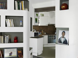 Though he appears to live alone, this graphically inclined Parisian commissioned an apartment that deftly houses his many roommates—scores of beloved comics—as well. Photo by Céline Clanet.