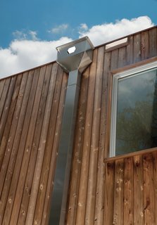 Suttles and Shah readied the house for photovoltaic panels, a solar waterheating system for the pool, and a rainwater collection setup.