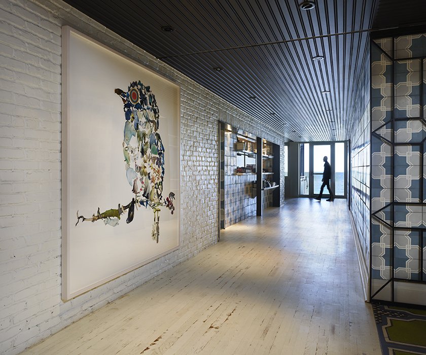 Mia Nielsen, the Drake's in-house art curator, populated the spaces with paintings, sculptures, and installations from contemporary practitioners. The owl is by Canadian artist Jennifer Murphy. The design team used a mix of materials and textures throughout the space to instill a feeling of
