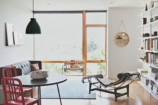 Green and Affordable Structure Fits Three Families in One 28-Foot-Wide Lot - Photo 3 of 11 -