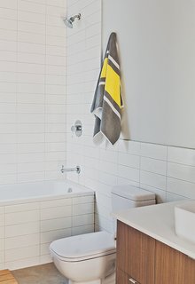 Green and Affordable Structure Fits Three Families in One 28-Foot-Wide Lot - Photo 7 of 11 -