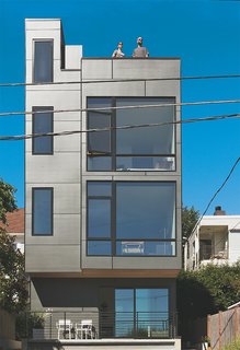 Green and Affordable Structure Fits Three Families in One 28-Foot-Wide Lot - Photo 8 of 11 -