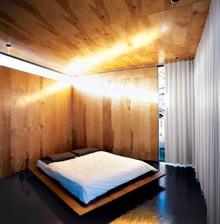 Thomas Bercy’s austere bedroom.