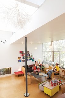 The first-floor great room is where all the action takes place. "It’s like Frank Lloyd Wright’s Usonian homes: everyone in one main space," Hale says.