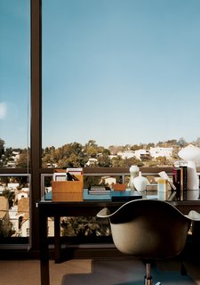 A well-placed writing desk takes advantage of the view.